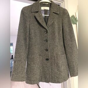 MaxMara-Lining inside has tears on each pit. Missing one button on the sleeve.